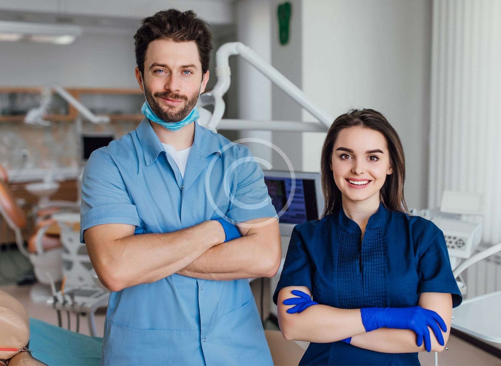 Male and female medical professionals posing together