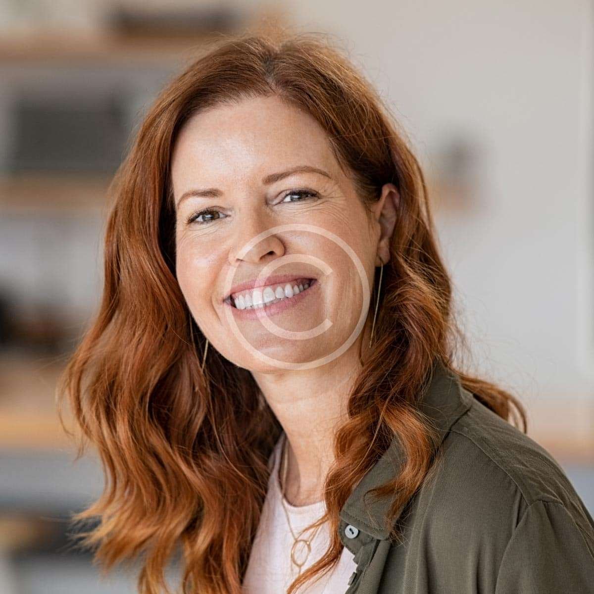 Red-haired woman smiling