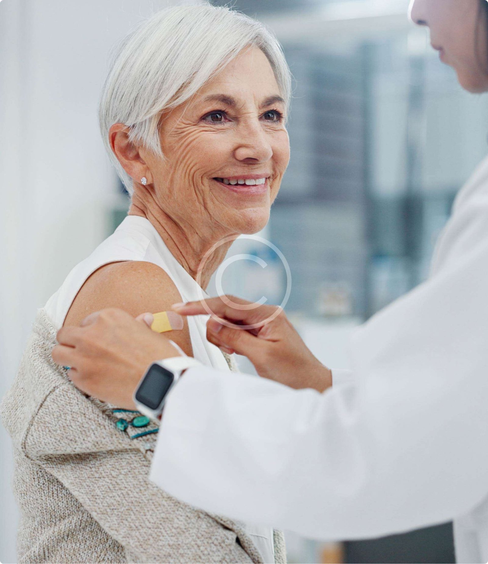 Doctor applying a bandage to a patient