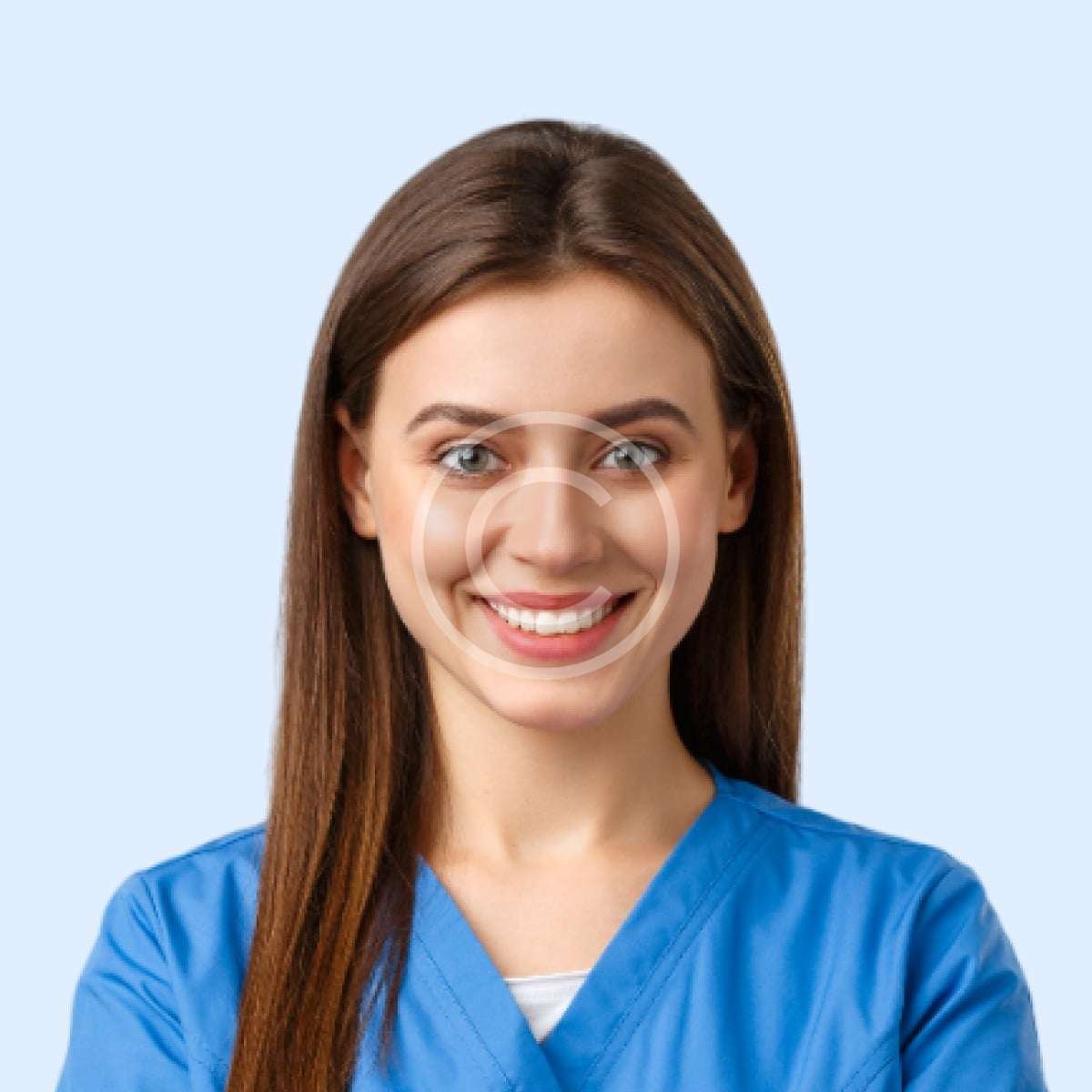 Smiling female doctor with green shirt