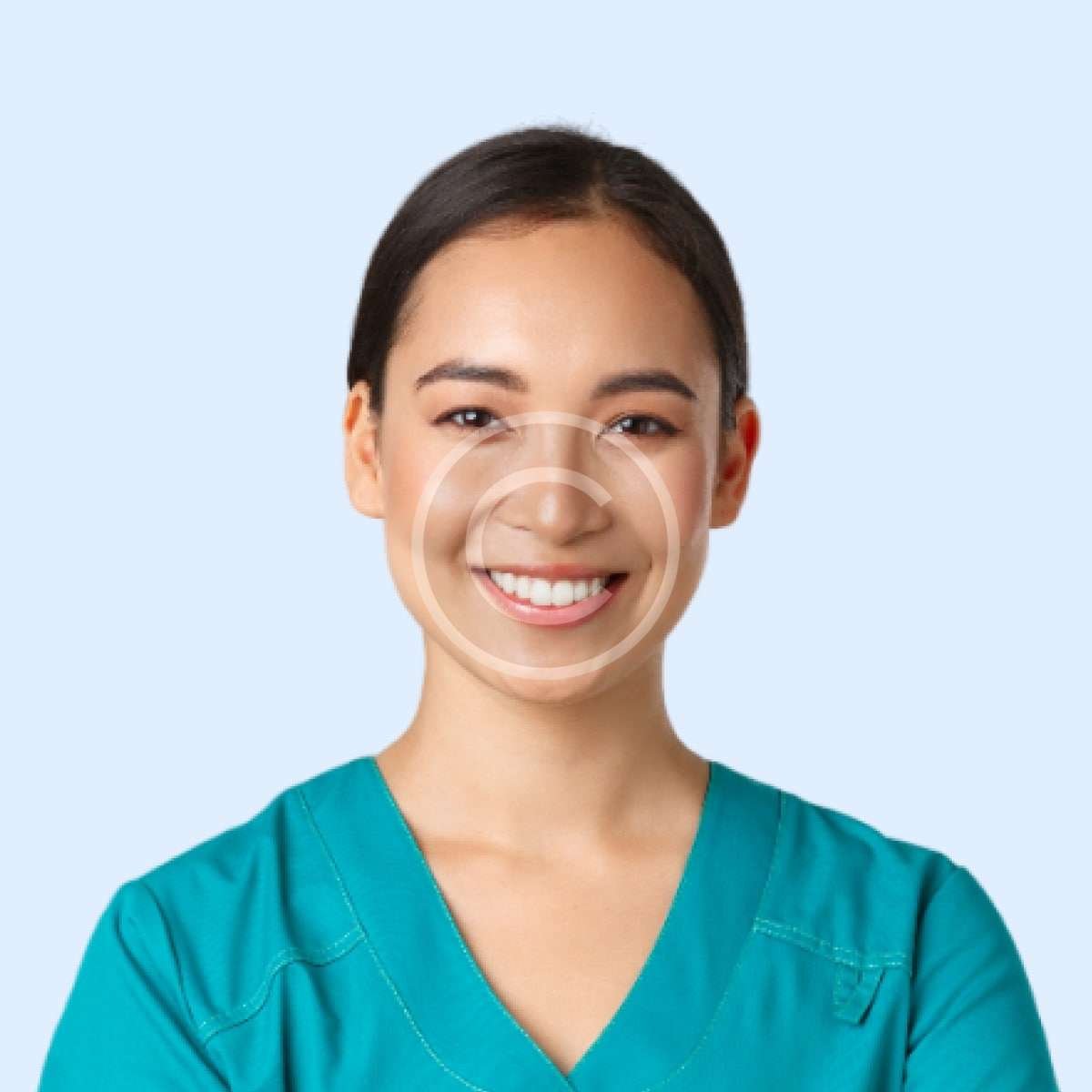 Smiling female doctor with turquoise shirt