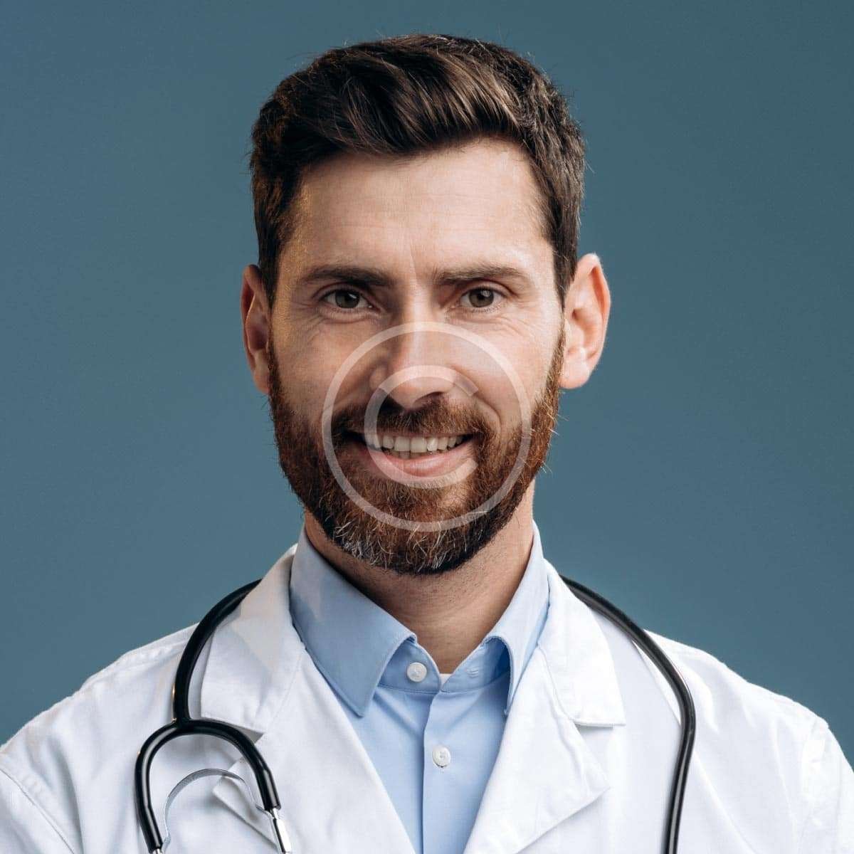Smiling male doctor with lab coat