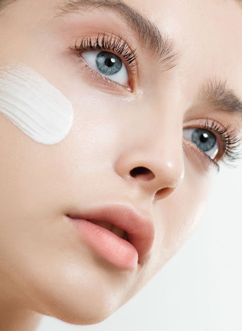 Woman with face applied to her cheeks