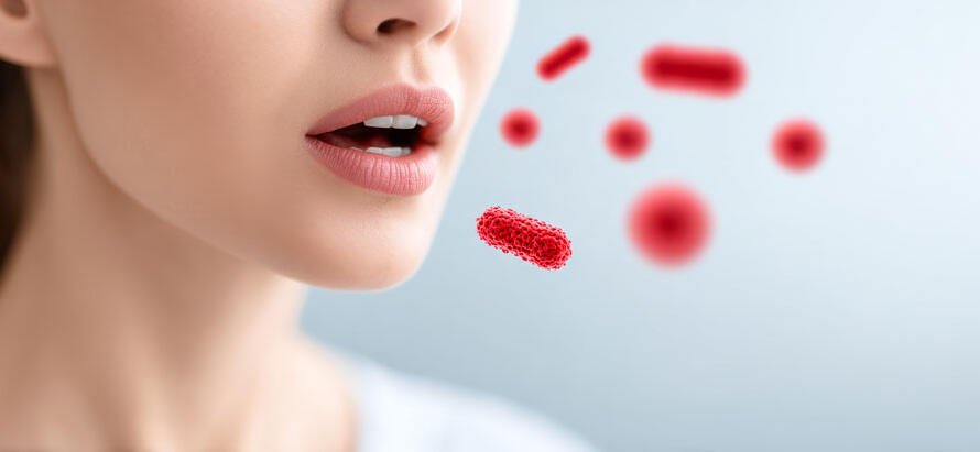 A woman breathing out air